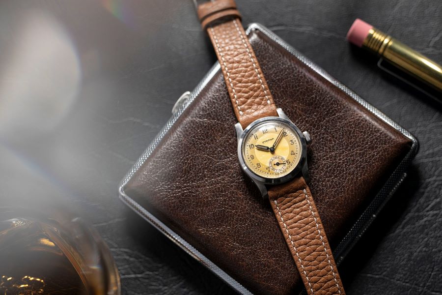 JPM Tan Leather Strap